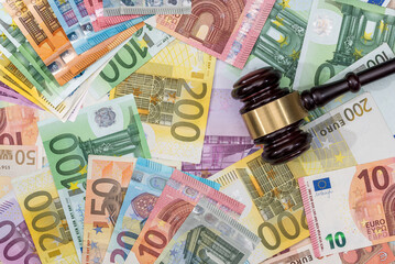Obraz na płótnie Canvas Judge's gavel on Eu paper Euro banknotes. Corruption and bribery concept