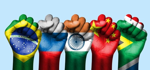 BRICS, five hands, with the flags of the countries, come together to form an economic group - obrazy, fototapety, plakaty