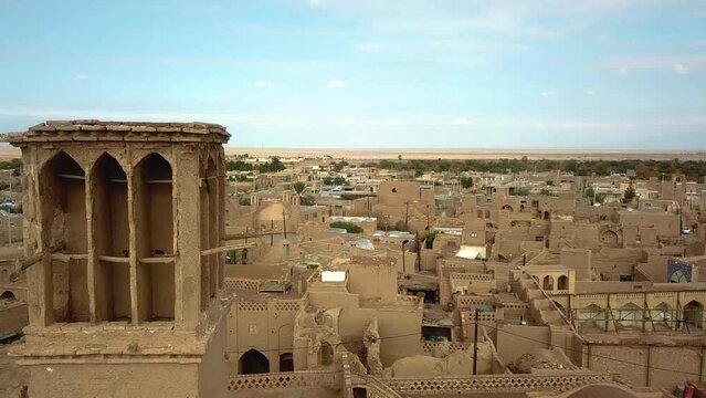 Passive architectural design in desert house comes with ducts that air flow moves in the traditional house by wind catcher to circulate ventilation fresh cool air in hot climate mud brick adobe houses