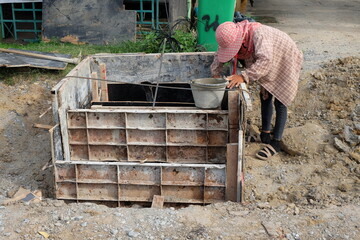 Labor builds drainage pipes, structures, utilities, and civil works.