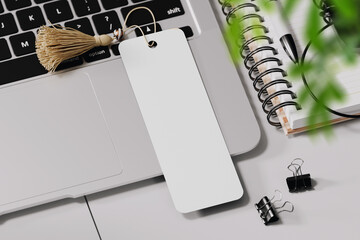 Bookmark with tassel on the laptop mockup. 3D rendering - obrazy, fototapety, plakaty