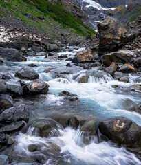 Water flows from Byron Glacier near Whittier , Alaska