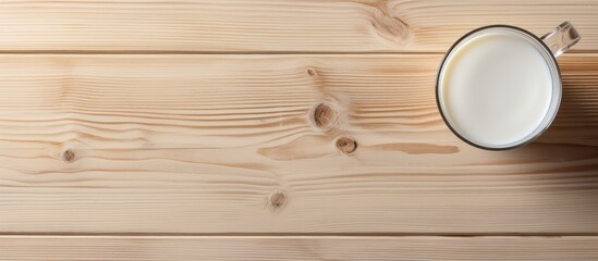 A glass of milk on a dark table Simplistic concept isolated pastel background Copy space