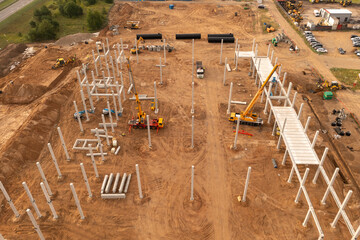 Drone photography of a large construction site with lots of machinery