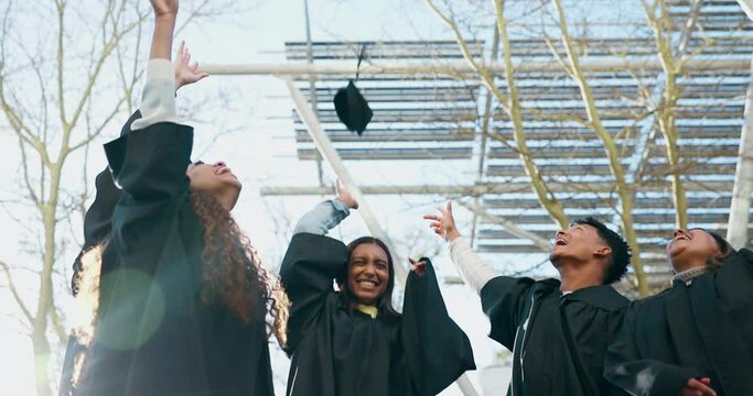 Graduate, group and school celebration with graduation cap throw and excited from university degree. College, friends and happy people together with achievement, motivation and education event