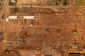 Drone photography of a large construction site with lots of machinery