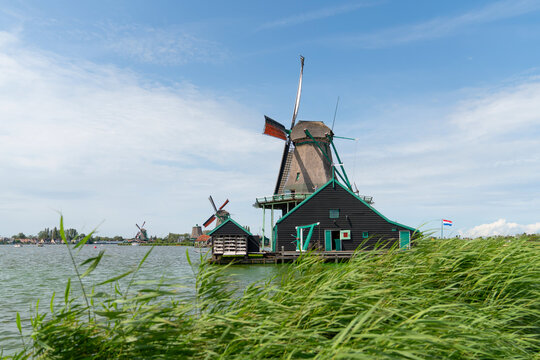 Zaanse Schans windmills. Netherlands rural landscape with  windmills in the famous tourist site. Zaandam. Holland.