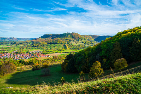 Germany, beautiful view above swabian alb nature landscape bissingen an der teck city houses sun day autumn colorful blue sky