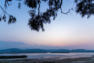 Twilight Tranquility: A Picturesque Evening by the Ason River Delta in Laredo, Spain