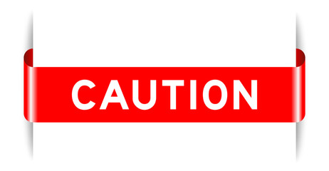 Red color inserted label banner with word caution on white background