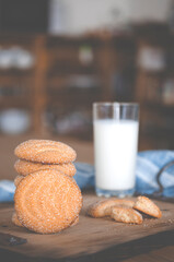 Homemade biscuits. Round homemade cookies with milk. Homemade cakes.