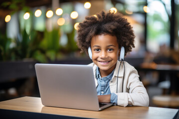 African Afro-american student smile using laptop online and headset