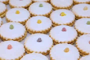 selection of jam tarts side by side on a baking tray