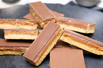 plate full of caramel shortbread biscuits