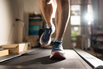 Men running on a treadmill at home