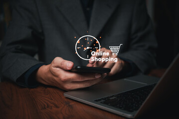 concept nonstop service online shopping available 24/7.businessman hand holding a virtual 24/7...