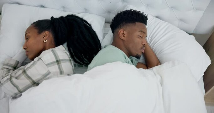 Frustrated black couple, conflict and fight in bed above argument, disagreement or divorce. Top view of African man and woman in dispute, ignore or cheating affair and toxic relationship in bedroom