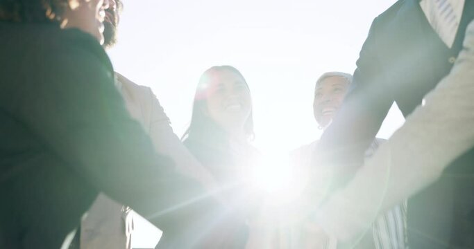 Hands, collaboration and applause with a business team in a huddle for celebration of a goal or target together. Meeting, smile and support of success or motivation with an employee group in a circle