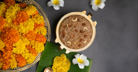 Kerala Temple Payasam with flowers on the background, Pongal concept image