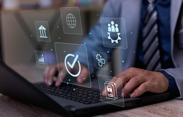 Businessman working on computer and showing the sign top Quality Assurance Standard Assurance ISO Certification and Standards Concept Satisfaction with products and services.