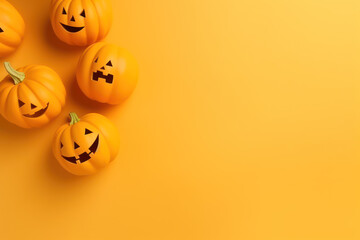 Pumpkins Jack o lantern on orange background, Halloween backdrop