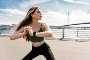 Interval training. Runner motivation and exercises for a healthy lifestyle. Athletic slim woman. A confident person training fitness in sportswear.