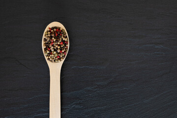 Pepper on a wooden spoon 