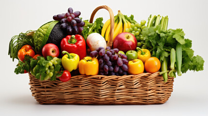 fresh and ripe vegetables arranged in a basket isolated on white.