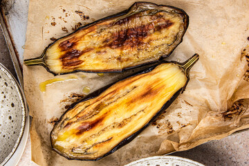 Roasted eggplant on the baking tray - 646464808