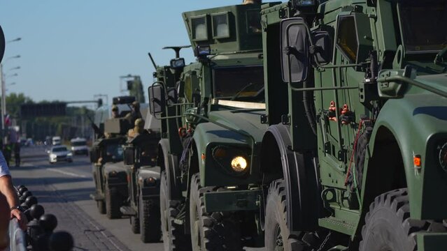 column of military vehicles at the parade