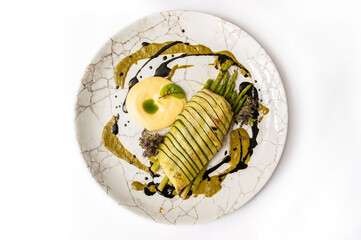 Halibut in zucchini mantle with asparagus and Hollandaise sauce