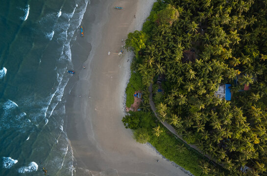 Tropical beach view with coconut trees, Kerala tourism concept background, Kerala Beach aerial drone view