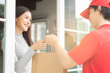 Postman, service shopping online asian young woman, girl hand received order, delivery man, male...
