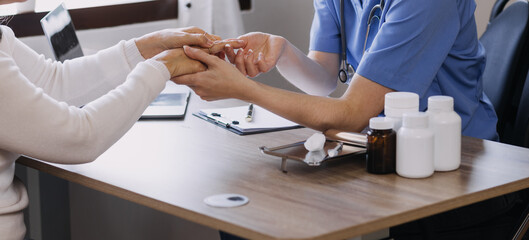 Homecare nursing service and elderly people cardiology healthcare. Close up of young hispanic female doctor nurse check mature caucasian man patient heartbeat using stethoscope during visit