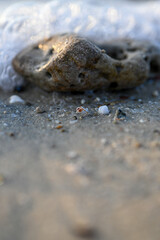hag stone with sew waves