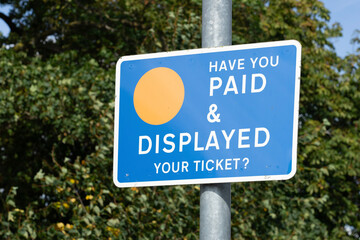 pay and display warning sign