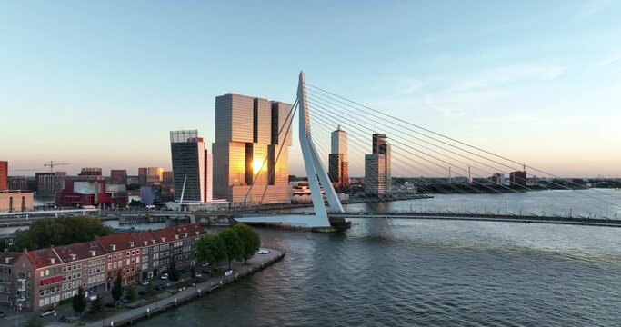 Aerial drone view of the Erasmusbridge, Erasmusbrug, cable bridge oner the Nieuwe Maas river in Rotterdam.