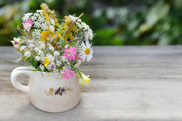 Naklejka na ściany i meble Adorable bouquet of summer wild flowers.