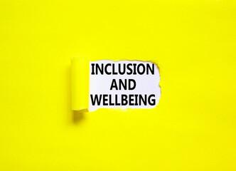 Inclusion and wellbeing symbol. Concept words Inclusion and wellbeing on beautiful white paper. Beautiful yellow background. Motivational inclusion and wellbeing concept. Copy space.