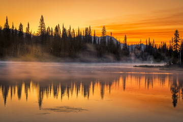 Dramatic sunrise colors over Reflection Lake in Mount Rainier National Park