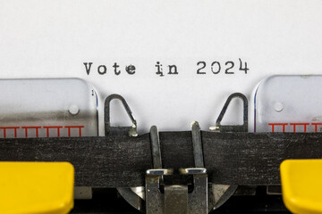 Vote in 2024 written on an old typewriter	
