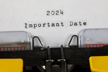 important Date 2024 written on an old typewriter	