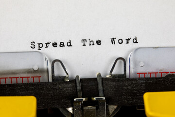 Spread the word written on an old typewriter, Gossip Concept
