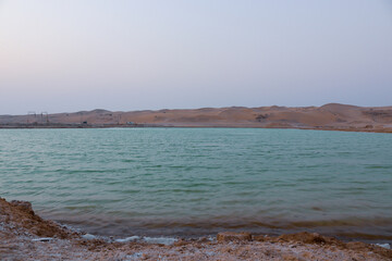 Landscape view of salt lake and desert dunes in Abudhabi