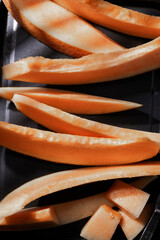 Sliced melon on tray. Healthy and genuine food
