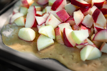 Chopped apples. Apple pieces. Red sliced pie apple. Selective focus
