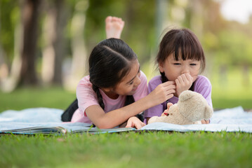 Asian family children elder sister comforts her younger sister