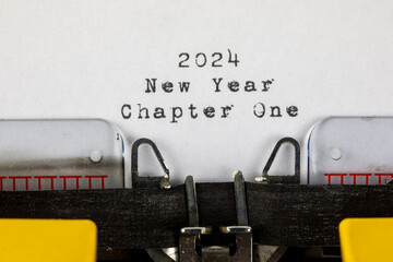 Old typewriter with text 2024 New Year Chapter One	
