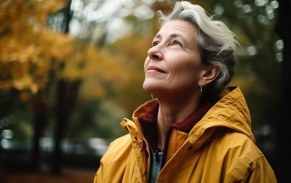 Thoughtful woman in jacket looking up in the autumn park. AI, Generative AI
