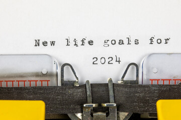 New life goals for 2024 written on an old typewriter	
